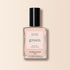 A bottle of Manucurist Pastel Pink nail polish from the Green™ range, with a black cap and quick-dry, intense color. The label showcases its Green™ credentials on a beige-toned background.