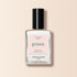 A clear glass bottle of Manucurist Snow nail polish with a black cap, labeled "Green." The label reads "Nail Polish Snow," offering pure white, quick-dry intense color, displayed on a light pink background.