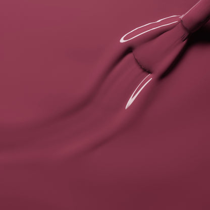 A close-up of a brush applying Manucurist&