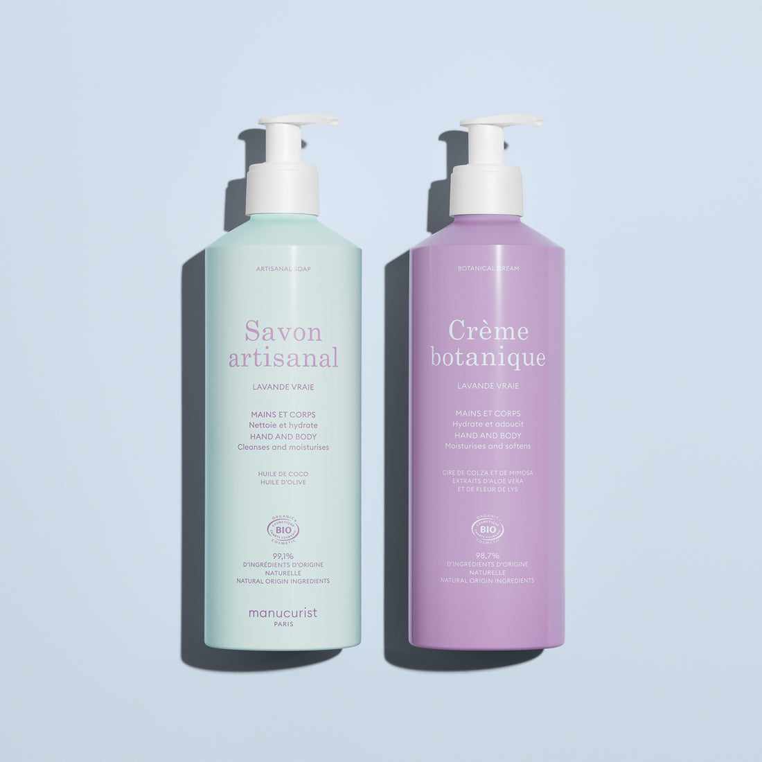 Two Manucurist products—Artisan Soap for hand and body (mint green) and Botanical Cream moisturizer (lavender)—from the Lavender Botanical Cream  Artisan Soap Duo, shown on a light blue background.