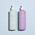 Two Manucurist products—Artisan Soap for hand and body (mint green) and Botanical Cream moisturizer (lavender)—from the Lavender Botanical Cream  Artisan Soap Duo, shown on a light blue background.