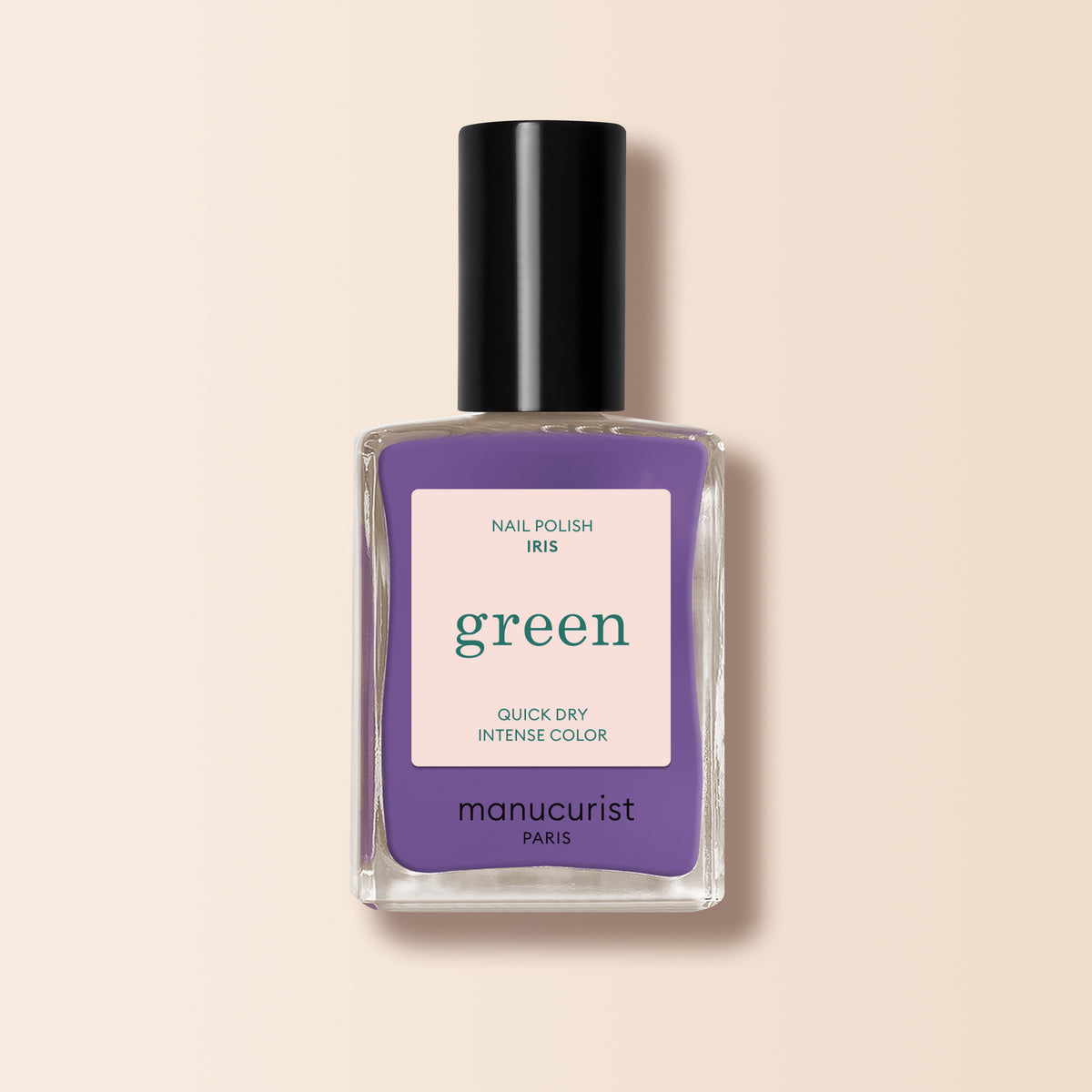 Manucurist Iris is a purple nail polish with blue undertones from the Green™ range, featuring quick-dry intense color, a black cap, and a beige label.