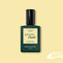 A bottle of Manucurist Mimosa Green Flash gel polish, in a dark green rectangular bottle with a black cap and pastel yellow label, is displayed on a light yellow background.