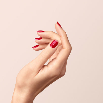 A close-up of a hand with neatly manicured nails painted in Manucurist&
